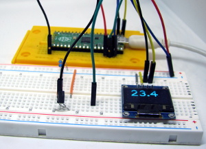Raspberry Pi Pico zeigt die mit dem 1-wire Sensor DS1820 gemessene Temperatur auf einem OELD an
